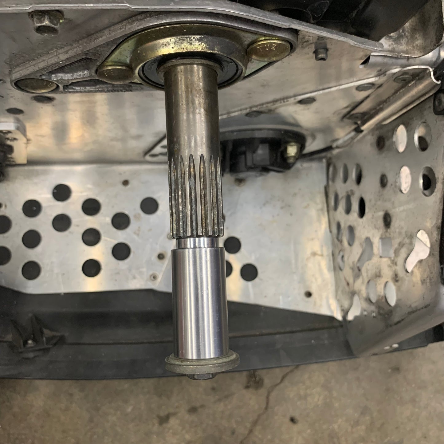 Regular stock clutch spacer shown installed on jack shaft without secondary clutch installed.