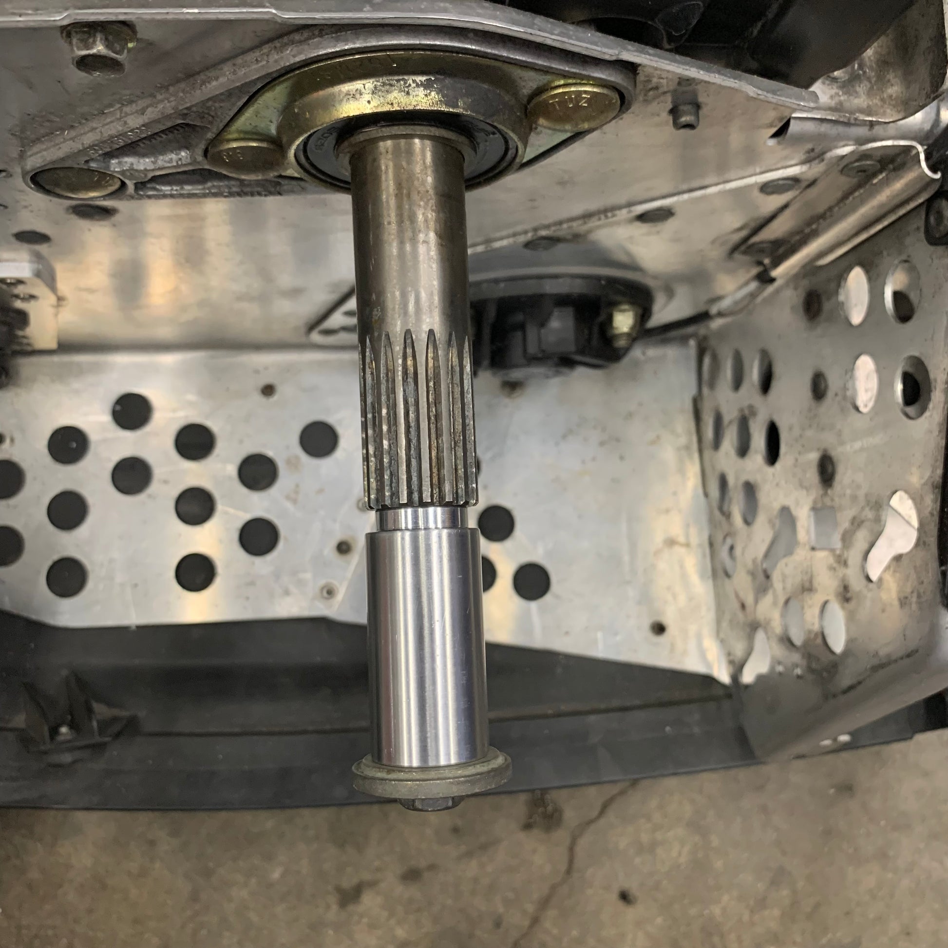 Regular stock clutch spacer shown installed on jack shaft without secondary clutch installed.