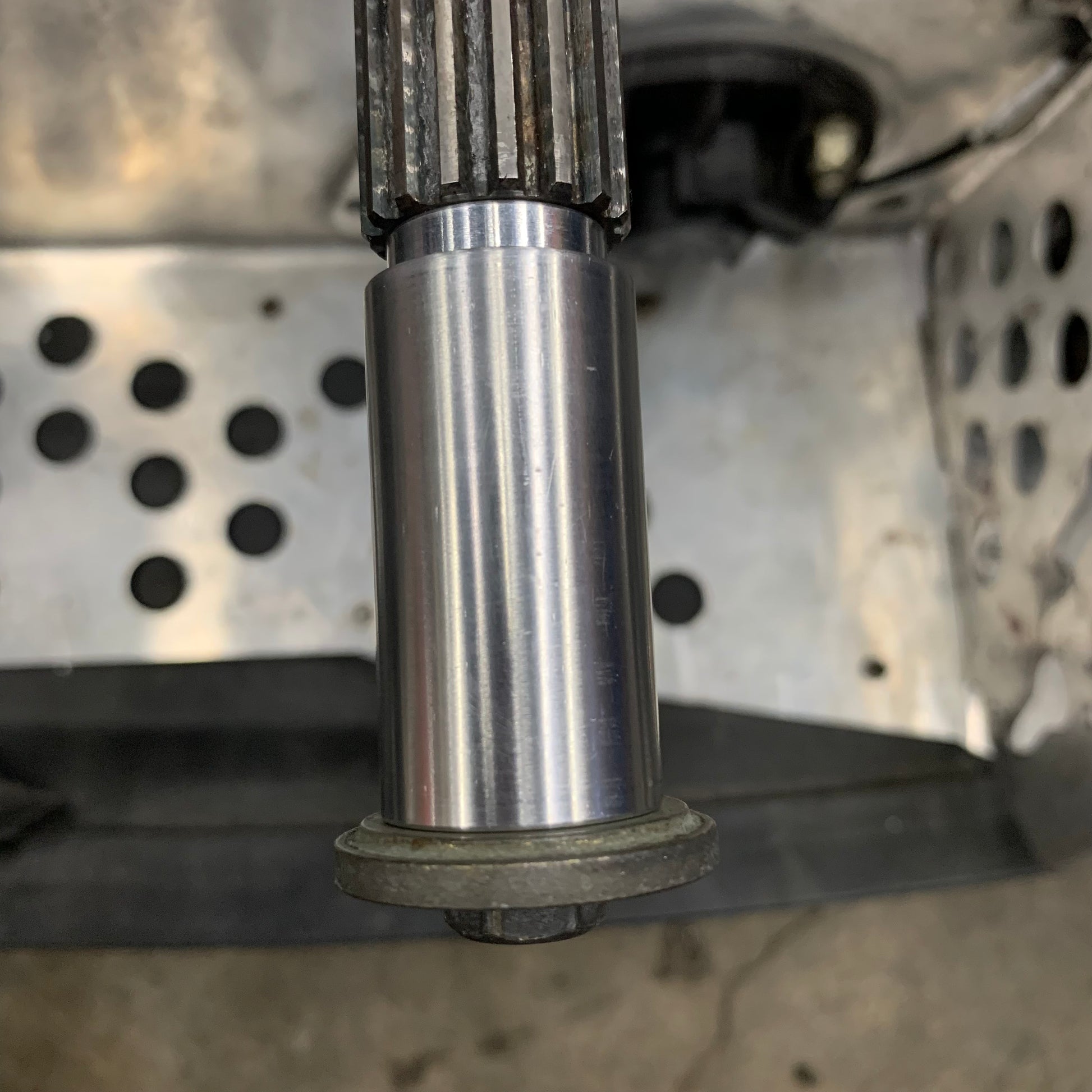 Regular stock clutch spacer shown installed on jack shaft without secondary clutch installed.